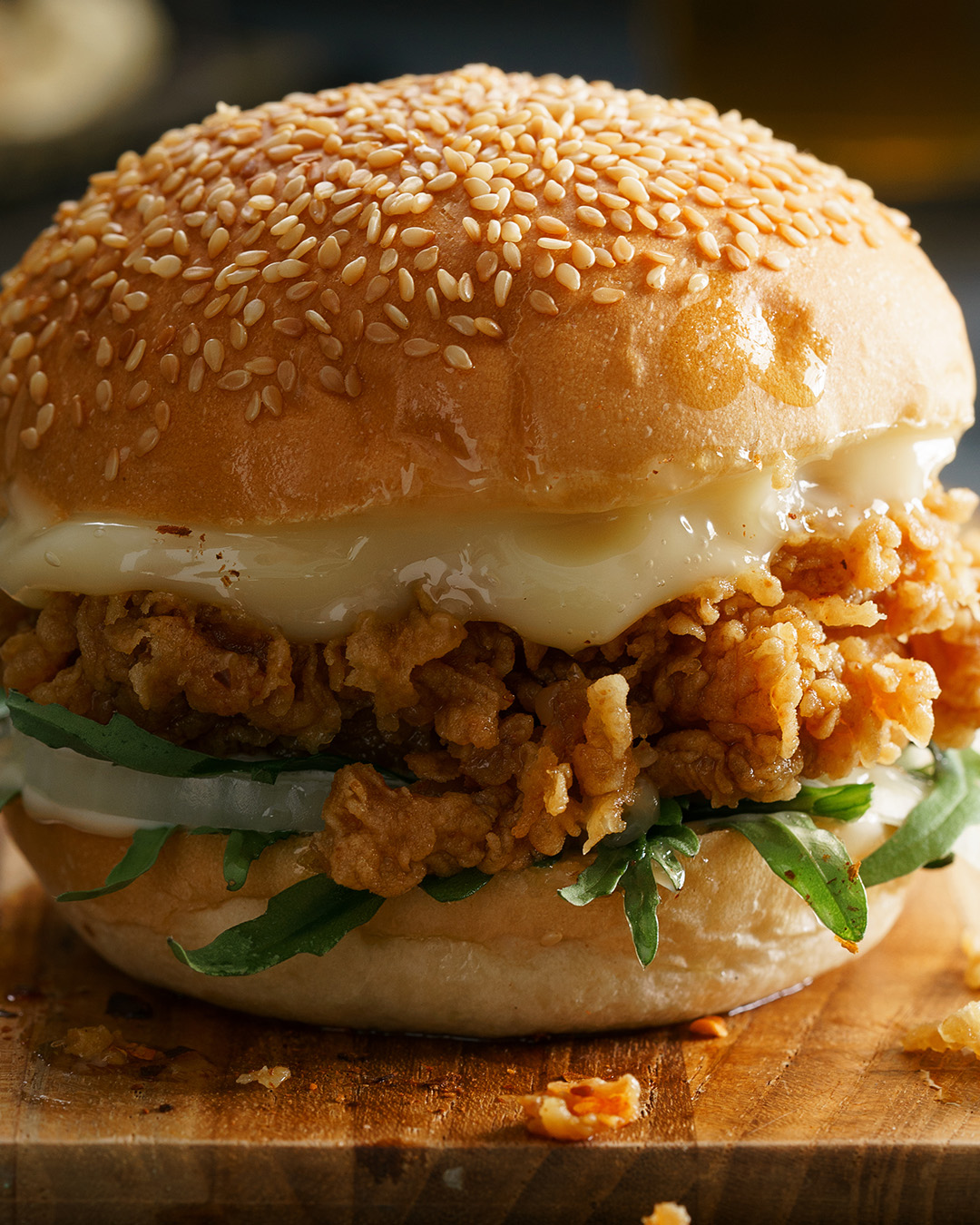 Fried chicken sandwich. Double-fried thigh, provolone melt, arugula, pickled onions, garlic aioli. The sandwich that ends arguments.