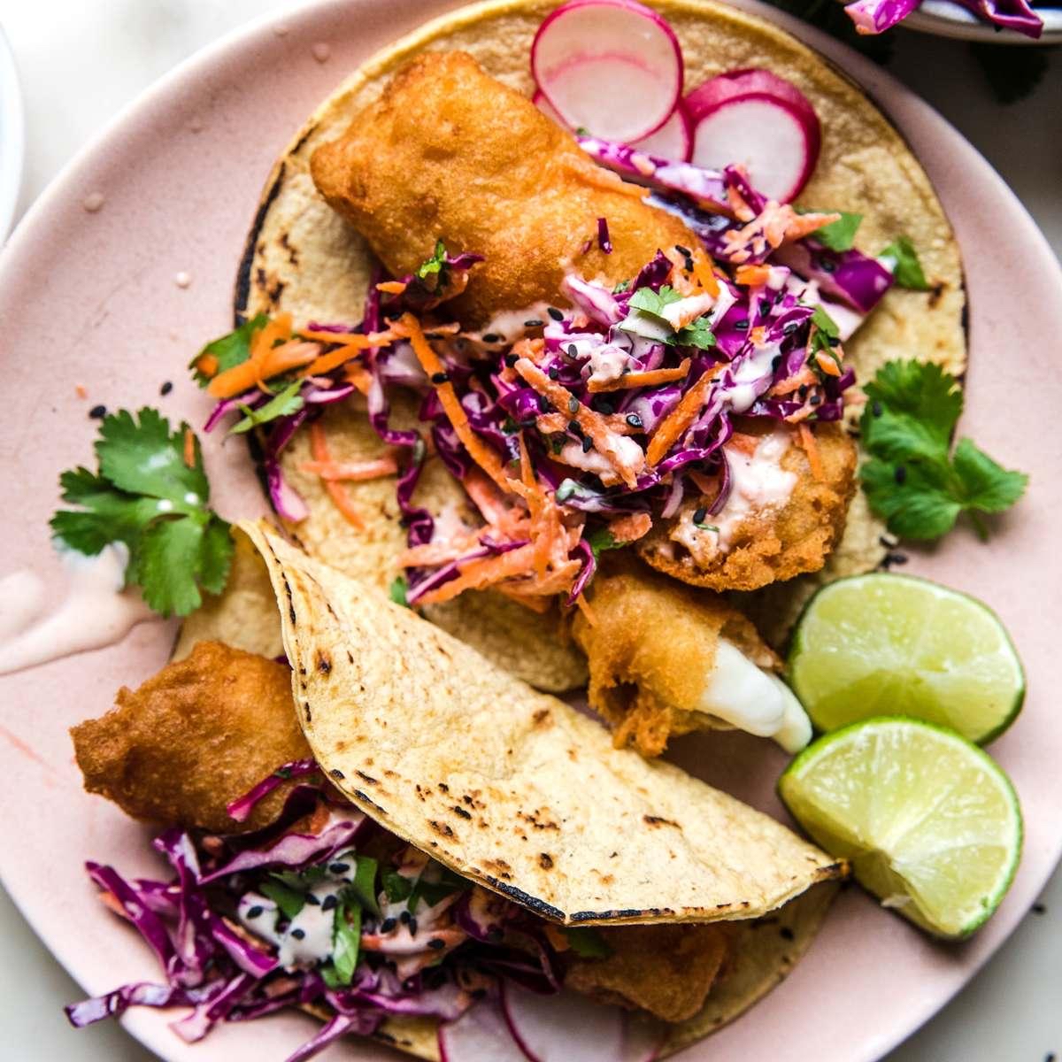 Restaurant-quality Crispy Battered Fish Tacos with Red Cabbage Slaw...Addicting!
