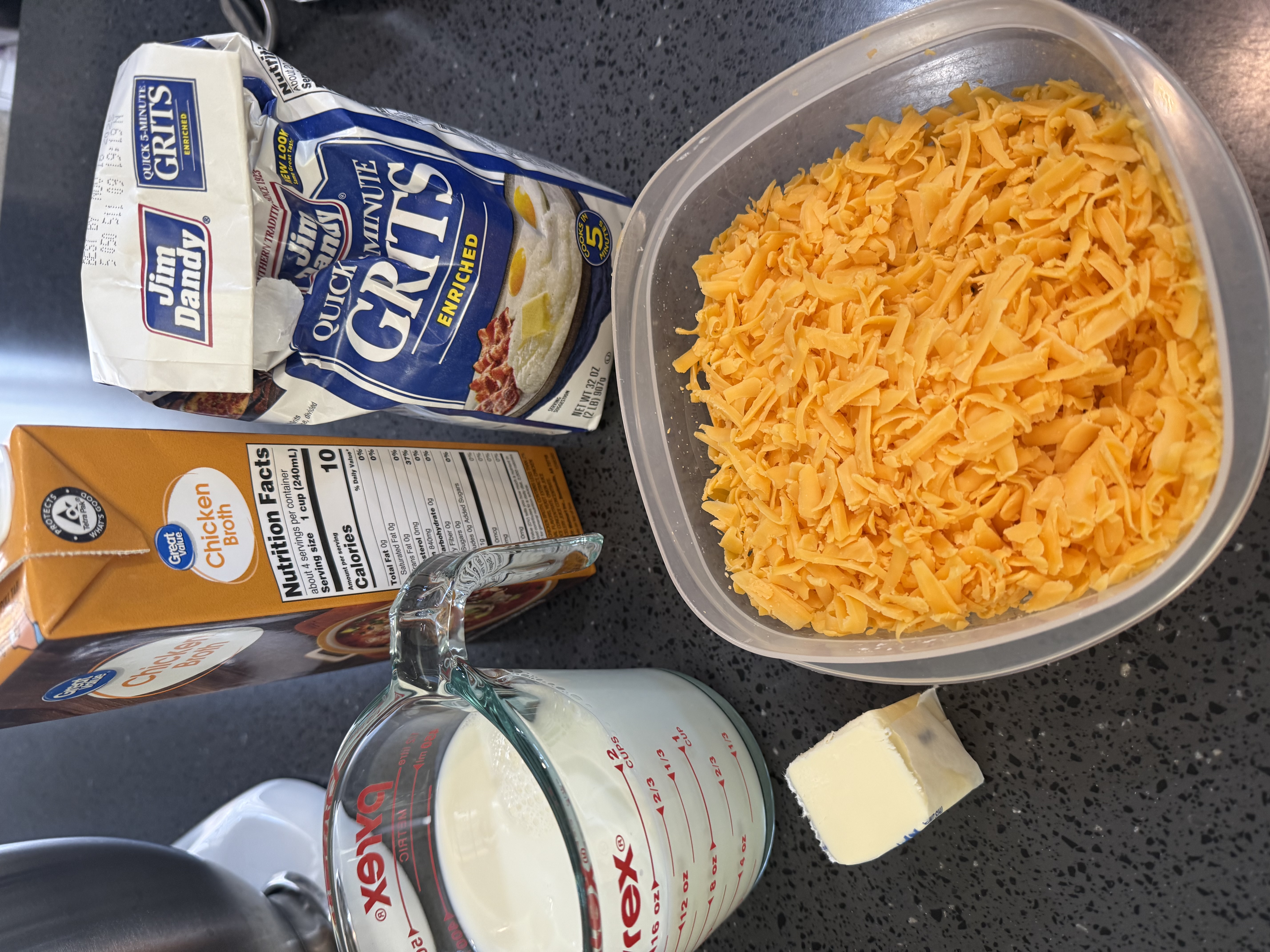 Only a few ingredients but Cheesy Instant Grits is SOOO flavorful and versatile! Add an egg or bacon or shrimp and you've got a meal!