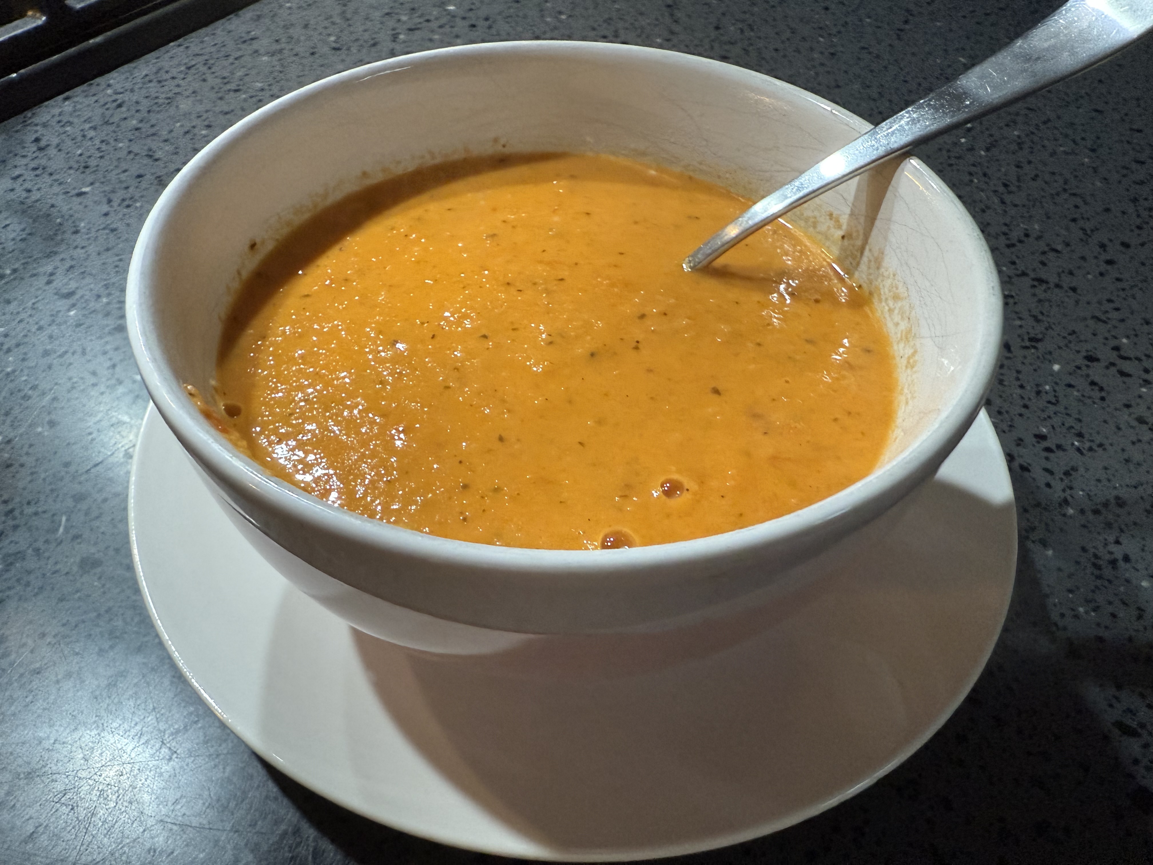 Slow-roasting transforms simple garden veggies into a deep, velvety soup that puts the canned stuff to shame. Pure comfort in a bowl.