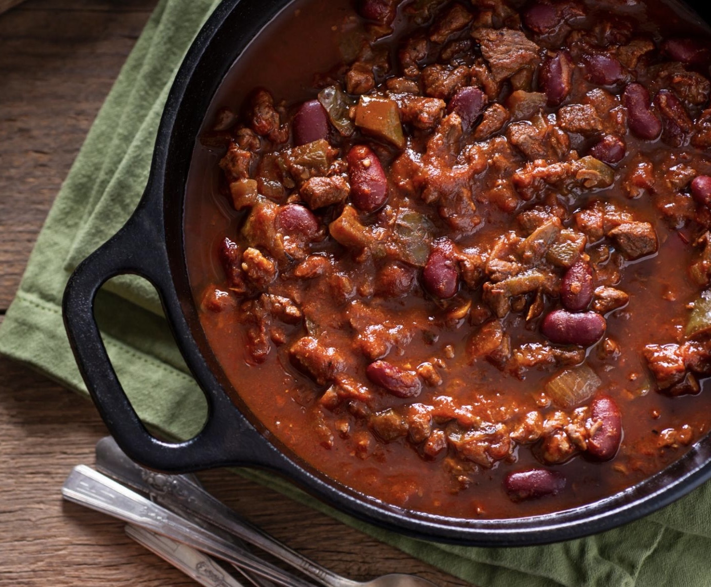 A classic, comforting chili that hits the spot every time! Perfect for a family dinner at home or a big group. Spice it up to your liking!