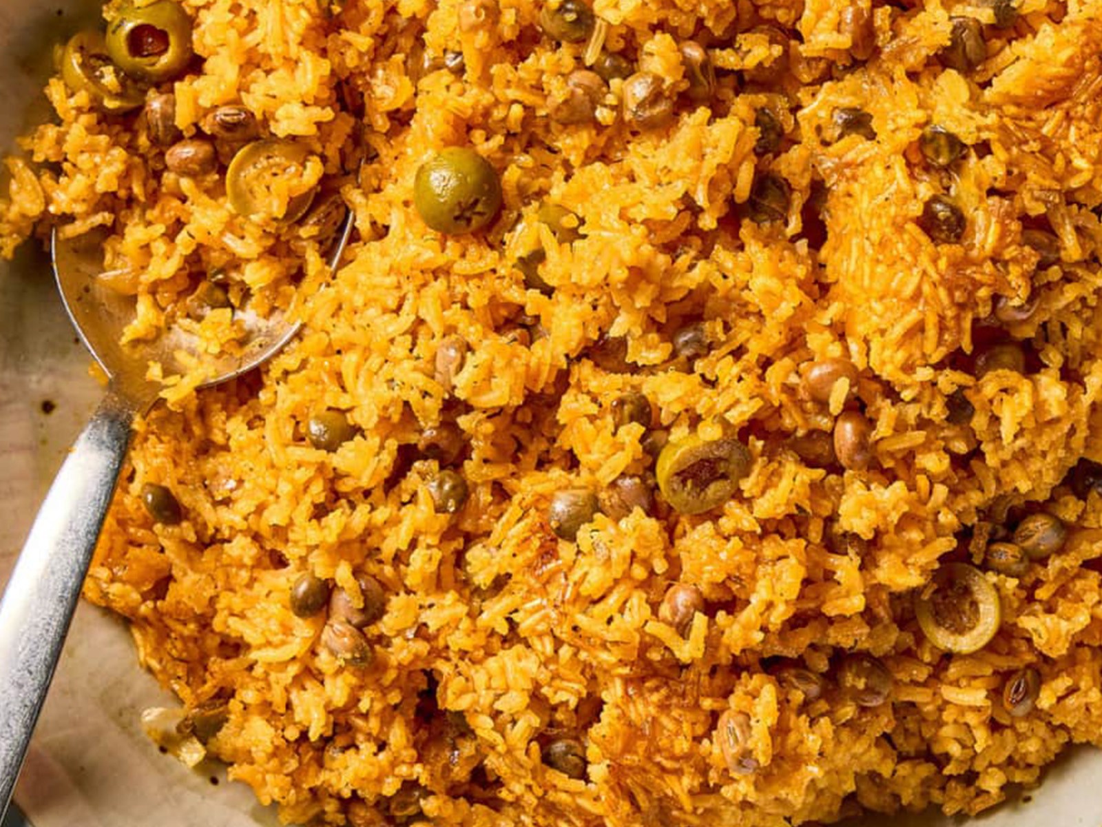 Puerto Rican pigeon peas and rice, or arroz con gandules, is comfort in a pot - fragrant with sofrito, garlic, and spices, simmered together until every grain is infused with flavor. It’s warm, savory, and deeply rooted in tradition.