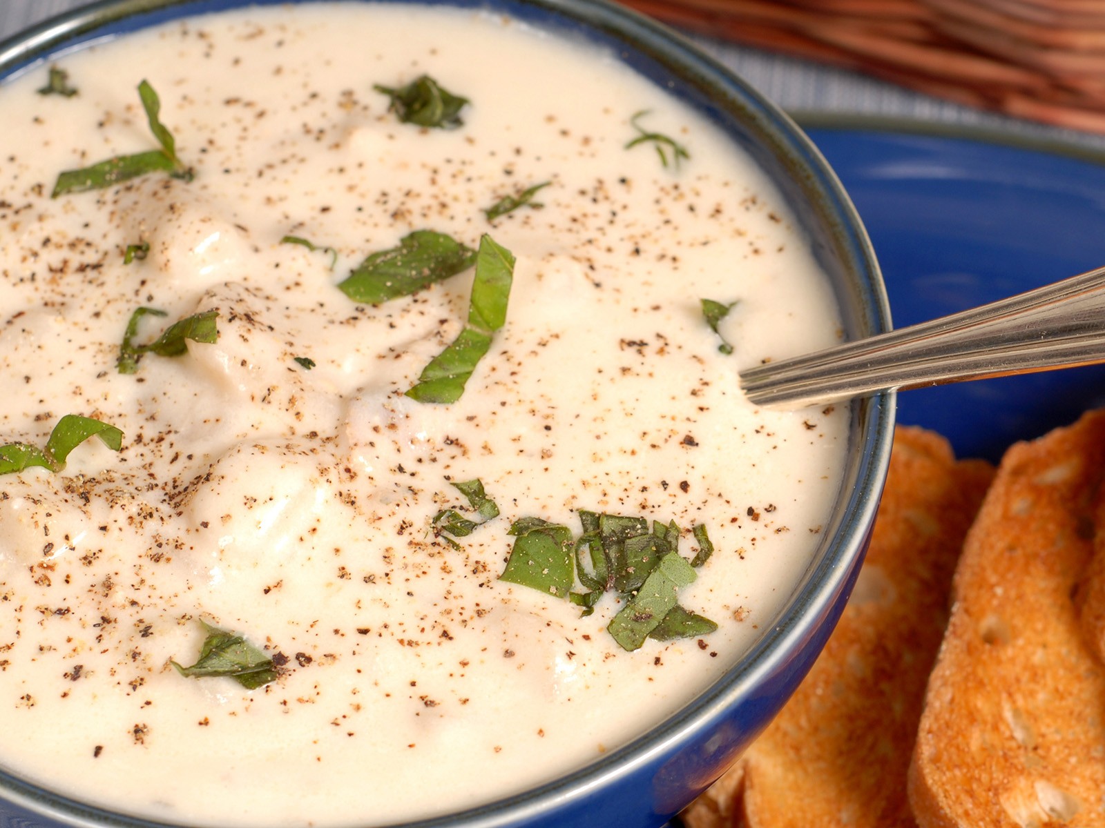 Thick, creamy, loaded with clams and potatoes. Made with fresh clams steamed open in white wine. The kind of chowder that makes you understand why New Englanders are so proud of it.