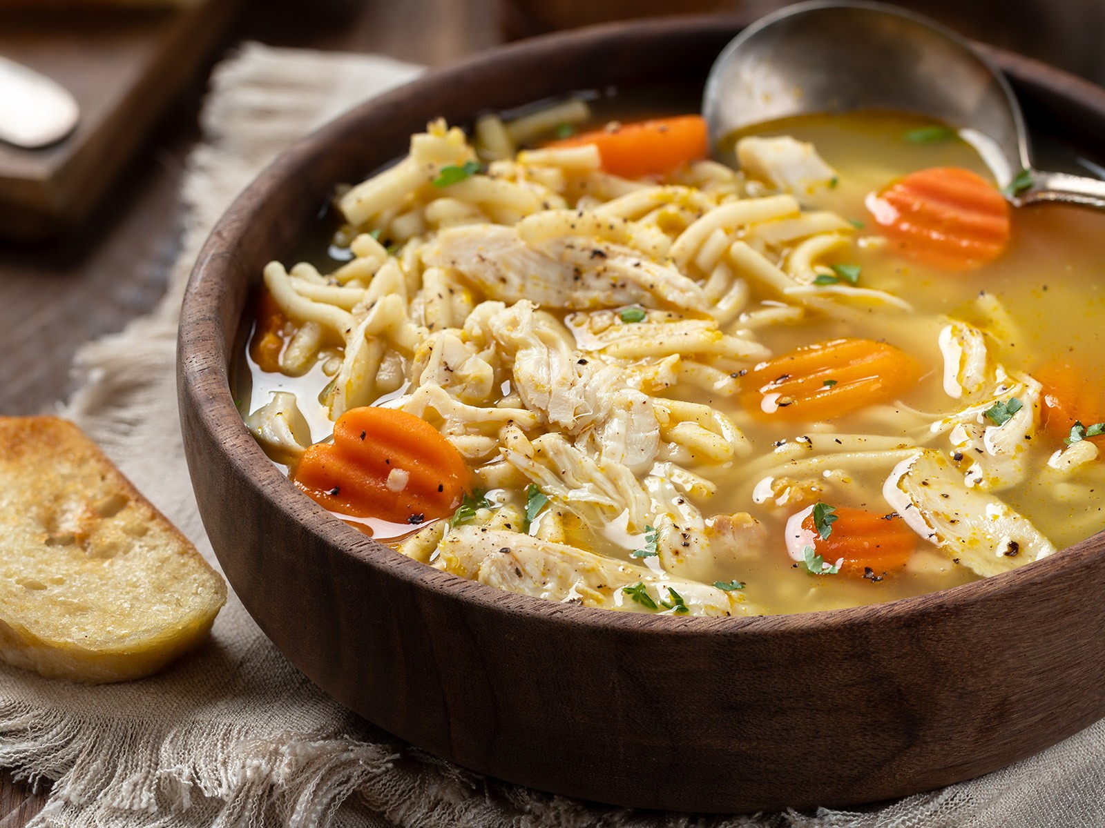 Made from scratch with a whole chicken, mirepoix, and fresh herbs. The broth is everything. Eight hours of patience produces something no store-bought version can touch.