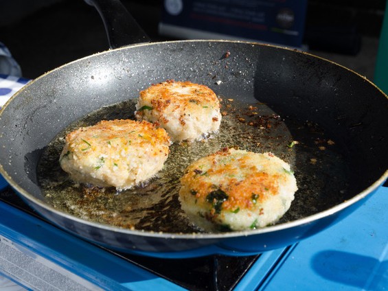 Mostly crab with just enough binder to hold them together. Old Bay, Dijon, and a touch of Worcestershire. Pan-fried in butter until the crust is deeply golden and the inside stays sweet and tender.