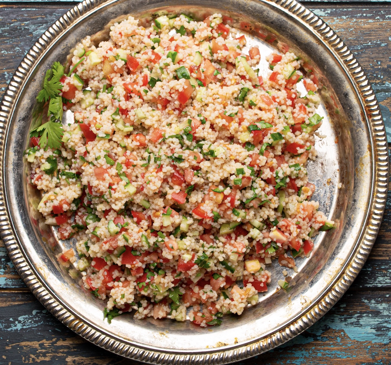 A refreshing, vibrant salad of finely chopped parsley, mint, tomatoes, and bulgur. Brightened with plenty of lemon.