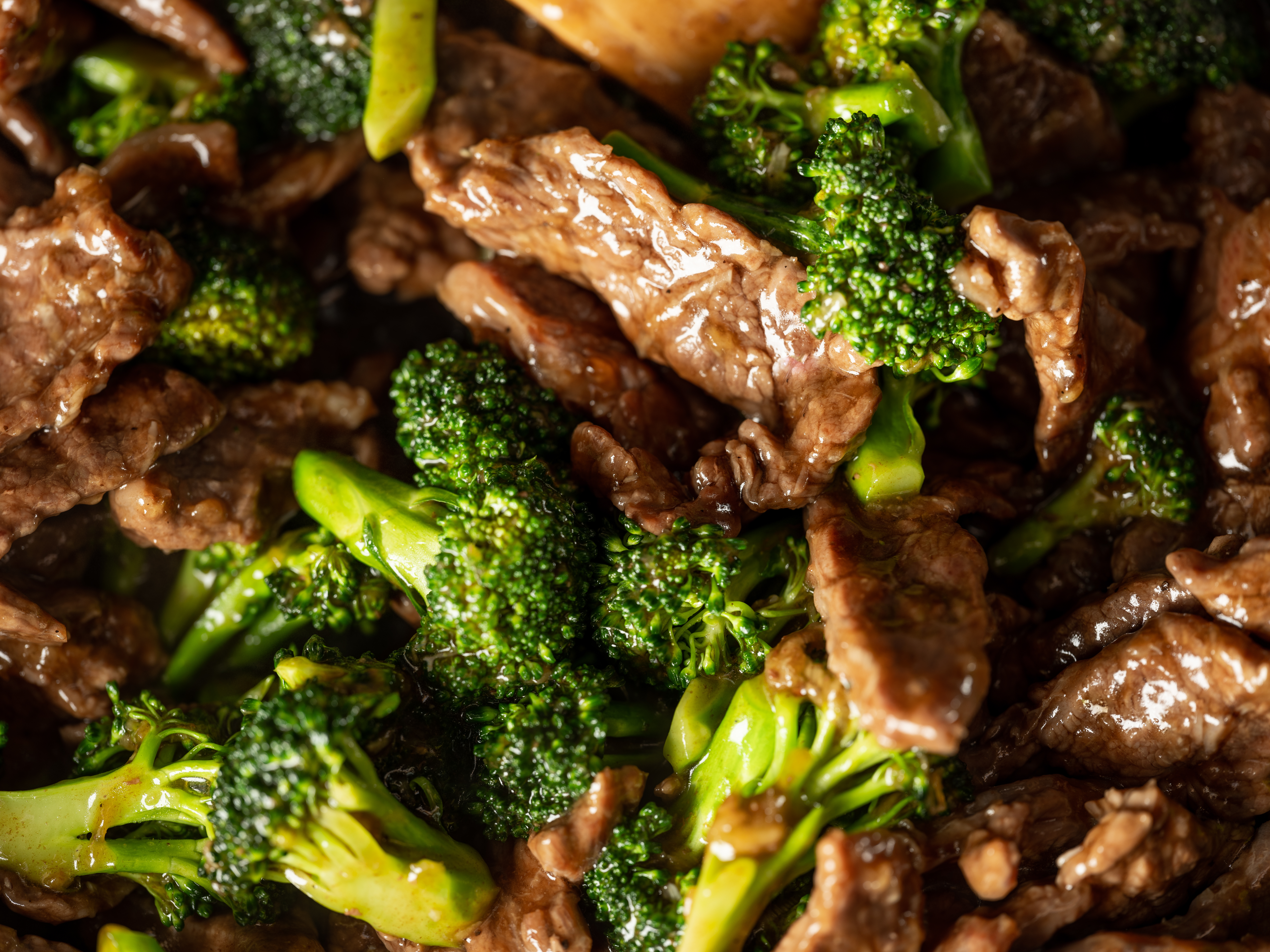 Tender beef and crisp broccoli in a rich garlic soy sauce. A quick stir-fry that beats takeout every time.