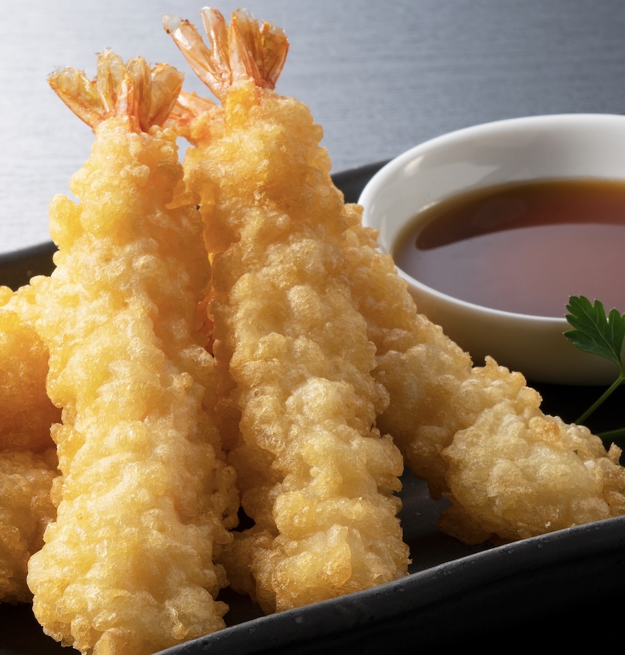 Light, crispy battered shrimp fried until golden. Delicate crunch with a simple dipping sauce. The sauce is light and savory dipping with soy, dashi, and mirin. Clean, umami-rich, and perfect for crispy tempura.