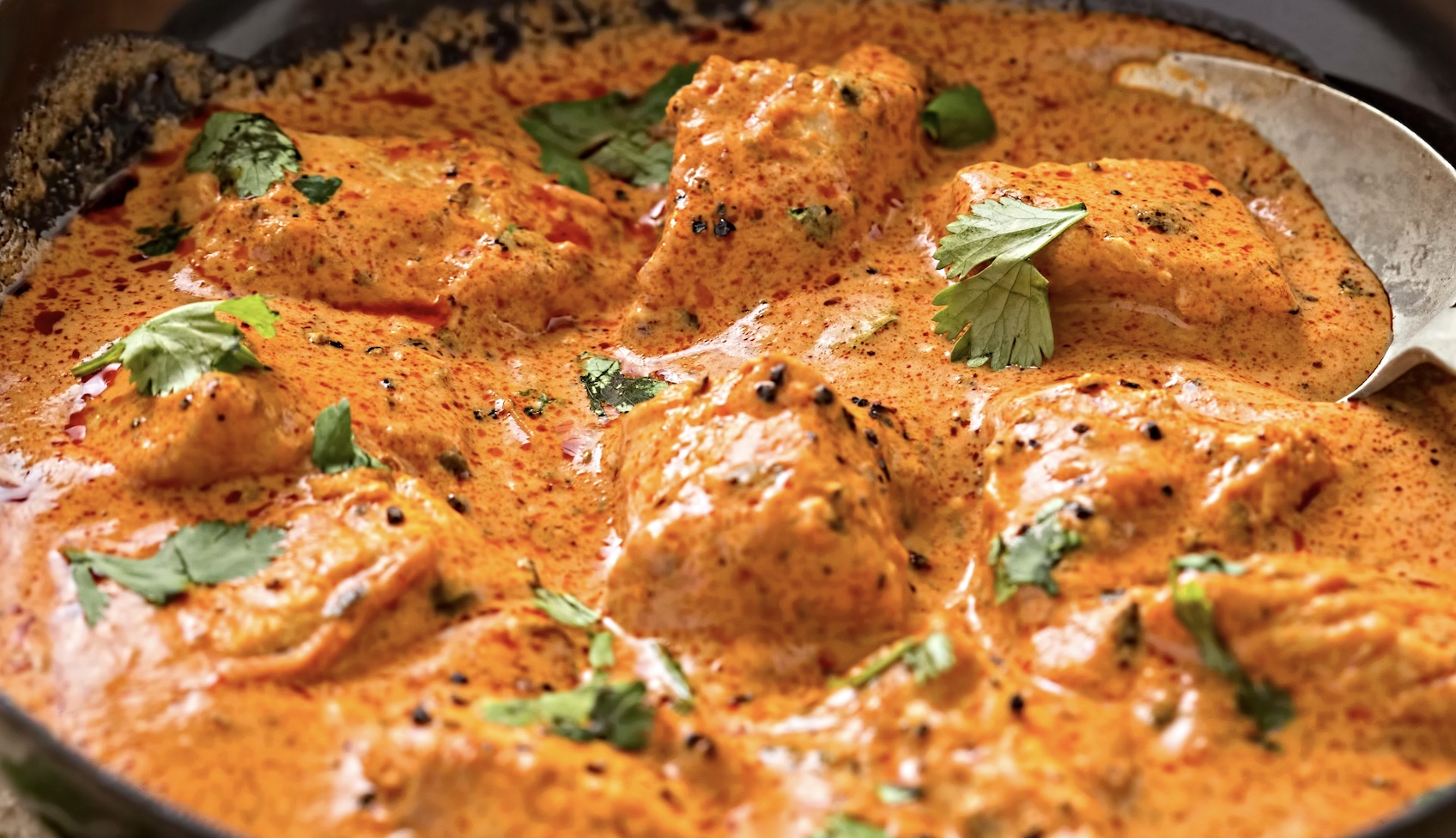 Creamy tomato curry with tender chicken, butter, and warm spices. Rich, comforting, and perfect with naan or rice.