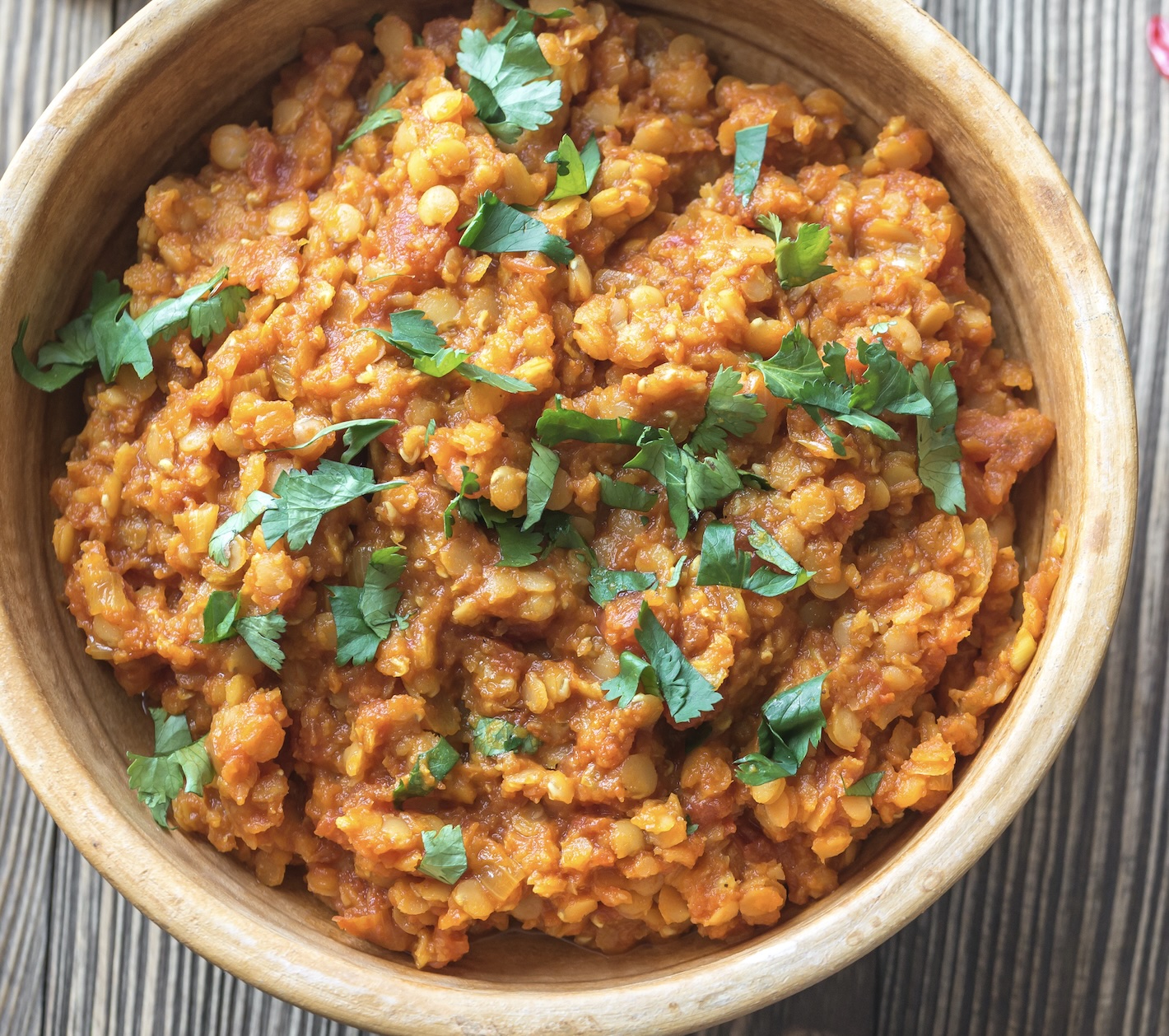 Comforting lentil curry simmered with spices and finished with a fragrant garlic tempering.