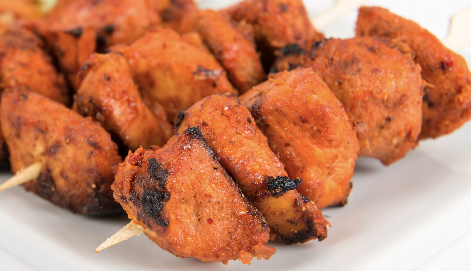 Spiced yogurt-marinated chicken grilled until smoky and charred. Bold, juicy, and full of flavor.