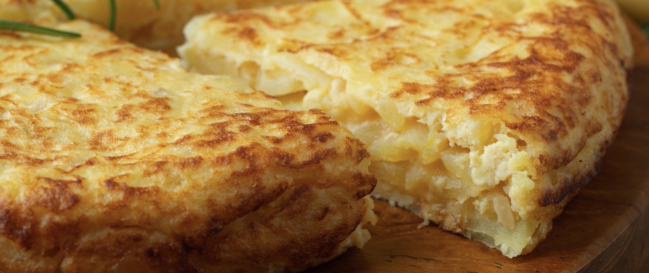 Thick omelet of potatoes and eggs. Simple, hearty, and perfect warm or at room temp.