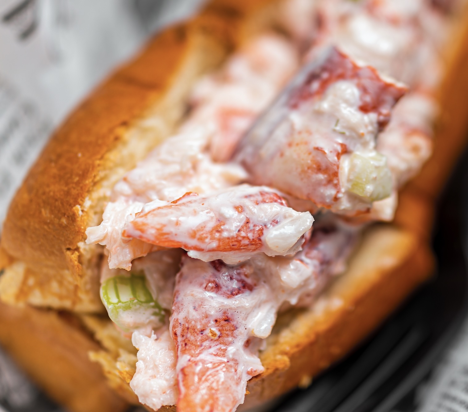Buttery roll filled with tender lobster and light dressing. Simple, fresh, and coastal perfection. This is the version with mayo...I like the other style too though! Lobster anything and I'm in!