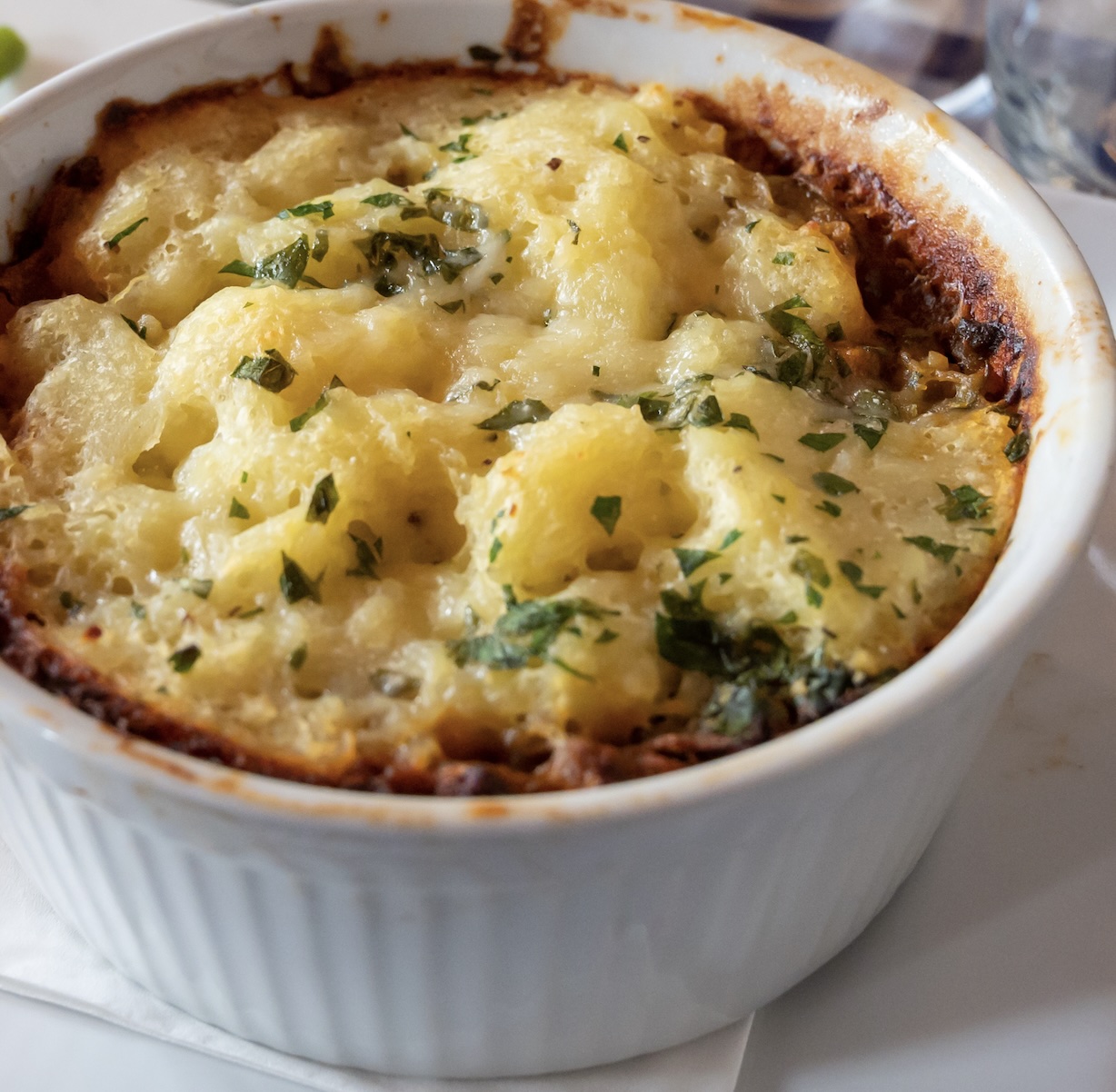 A hearty, savory classic. Mashed potato topping over a flavorful base of lentils, carrots, and peas. Comfort in every single bite.