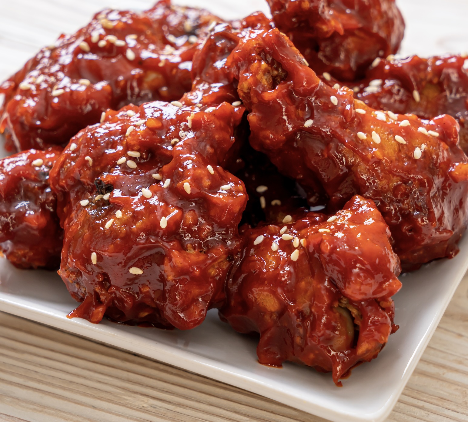 Super crispy, double-fried chicken glazed in a sticky, sweet-and-spicy garlic sauce. Irresistible and addictive. Finger-licking-good!