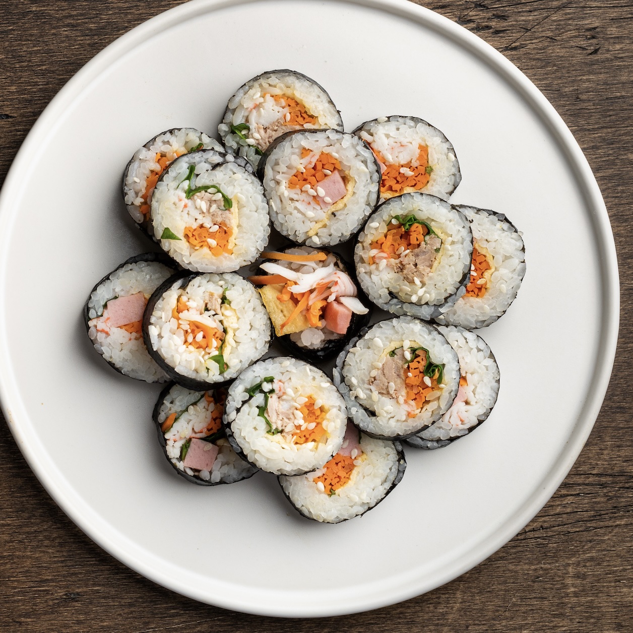 Korean seaweed rice rolls packed with colorful fillings like spinach, carrots, and ham. But good with crab or any protein (or none at all for a vegetarian dish). A perfect, portable lunch.