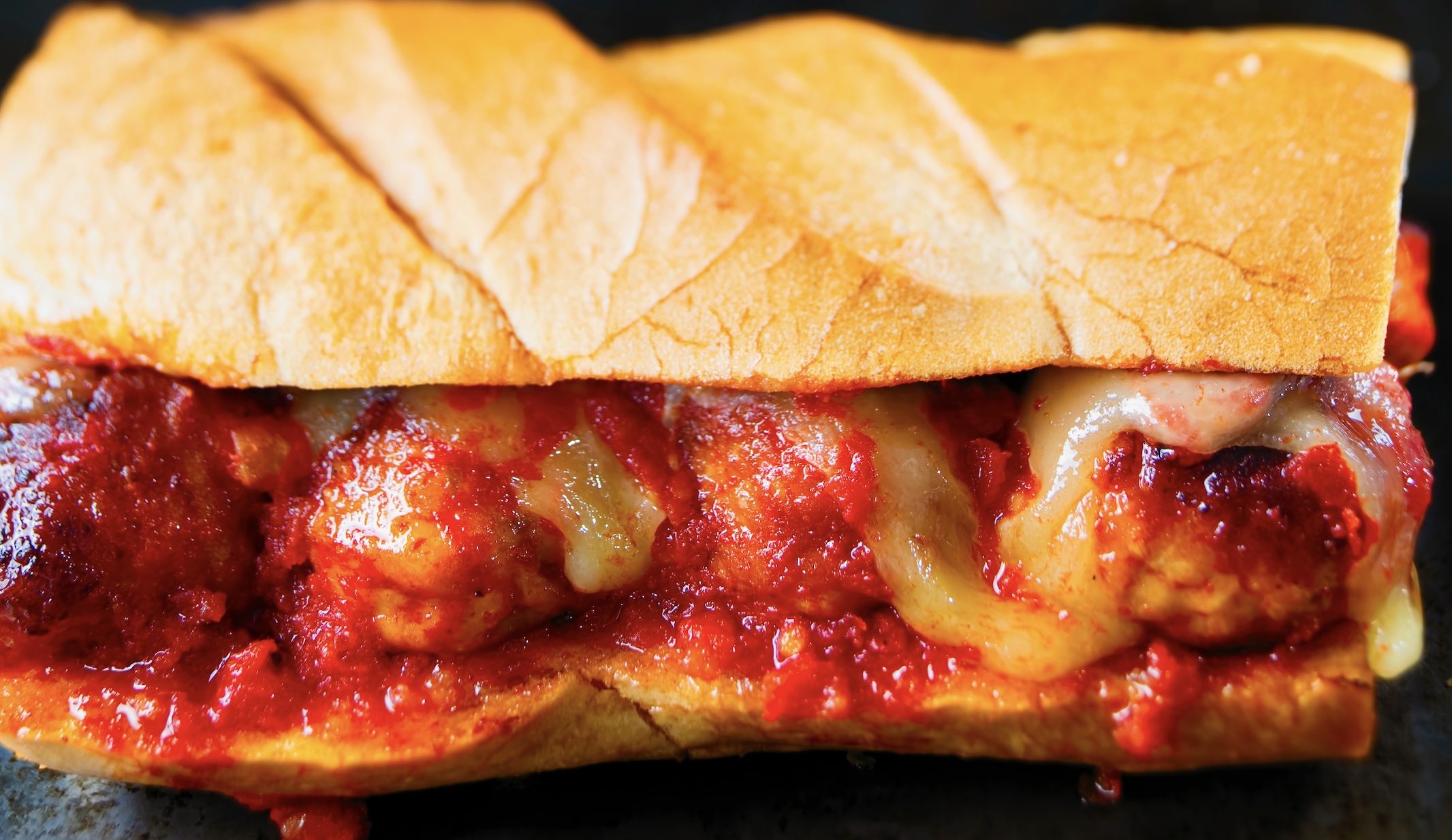 A leaner take on the classic. Using high-quality store-bought meatballs and sauce makes this a "dump" recipe that kids will request every week. Pair them with pasta or on a hoagie with mozarella.
